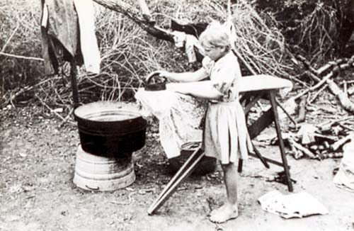 Migratory Worker Girl Ironing